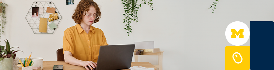 Working on an office table in an open space - not yet Leveraging Your CEH Certification